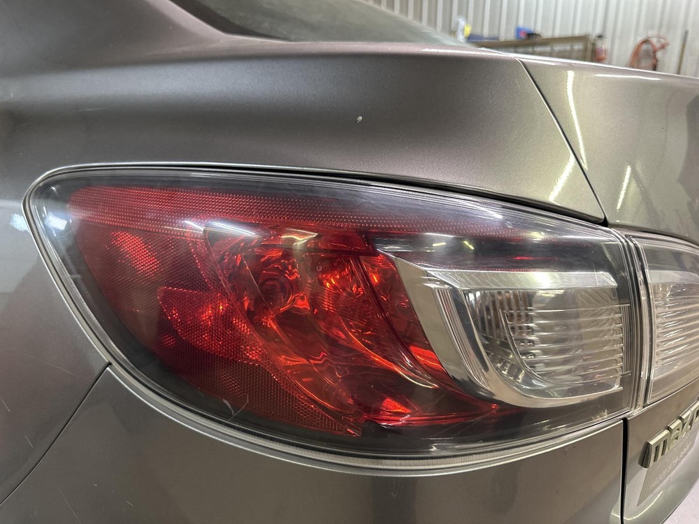 Used Left Tail Light Assembly for 2010 Mazda 3 Sedan Quarter Panel Mounted