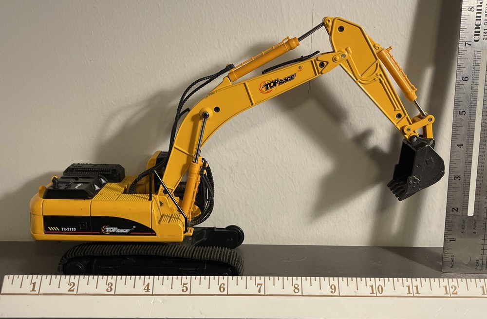 Excavadora Top Race Modelo TR211D Die-cast INCOMPLETA FALTA 1 PISTA