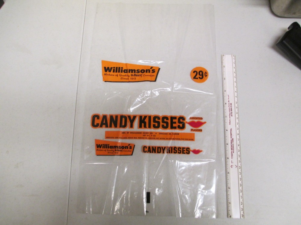 1950s Williamson Candy plastic candy bar bag with CANDY KISSES no zip light orange
