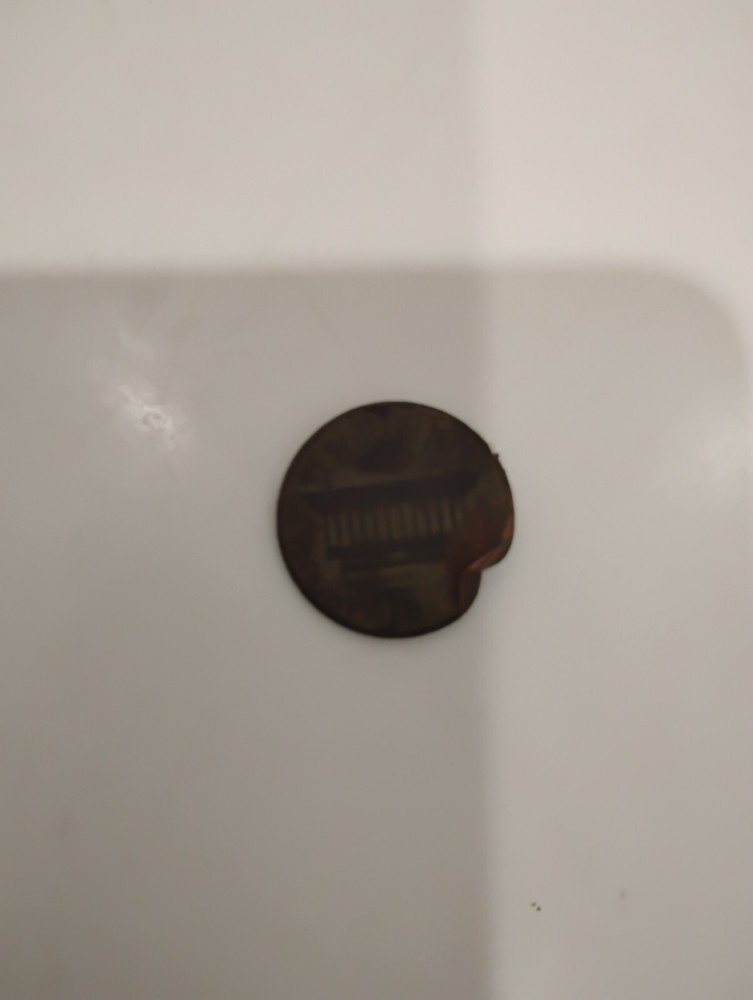Lincoln small cent, this error is called feeder finger  it is  a rare error