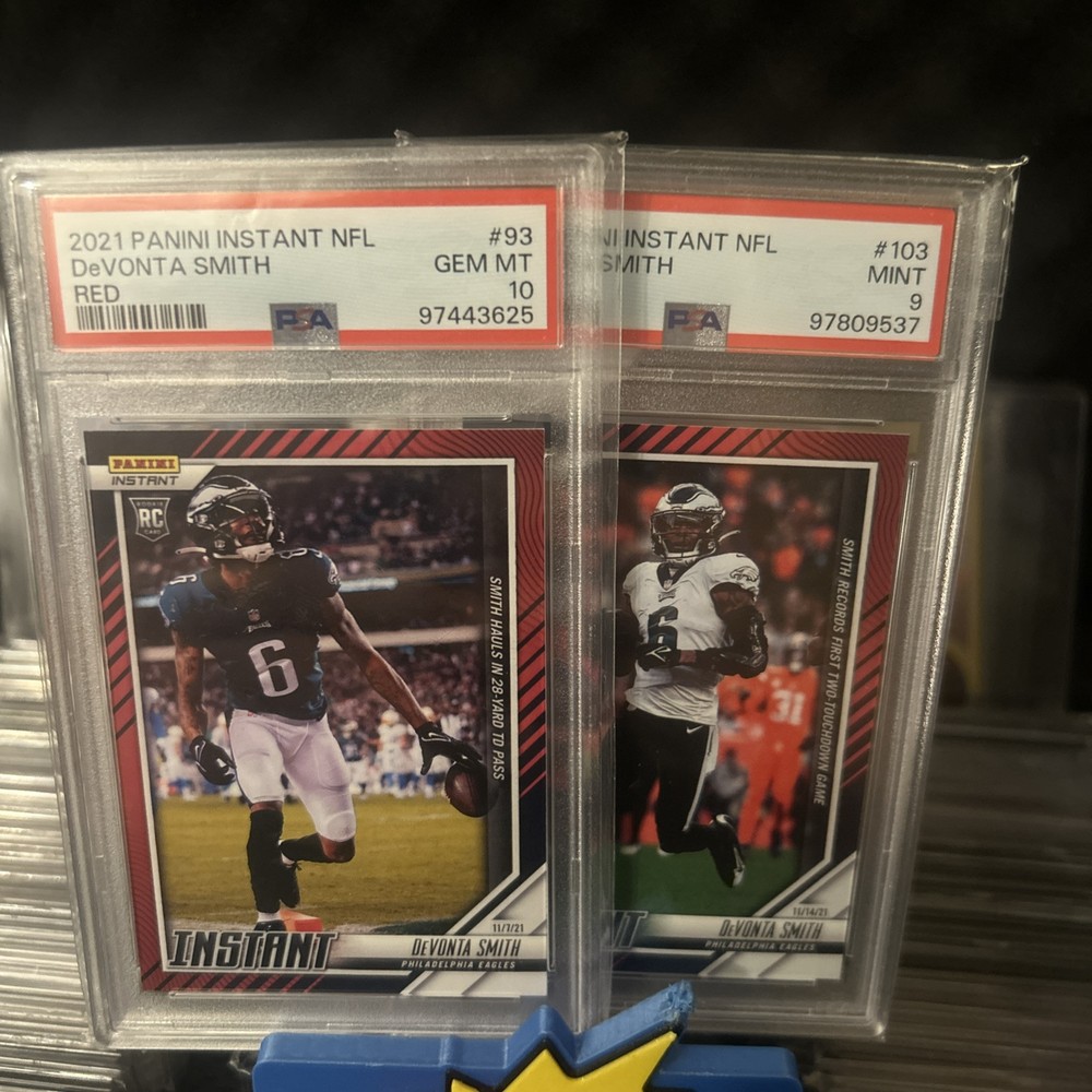 2021 Panini Instant NFL Devonta Smith Rookie Red PSA 10 44/99 & PSA 9 37/99 Card #93