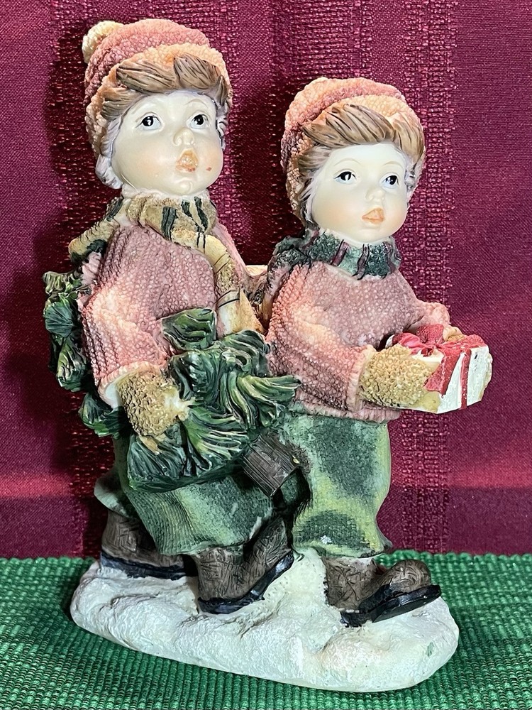 Festive Christmas Boy and Girl Figurine with Tree, Gifts, and Snow