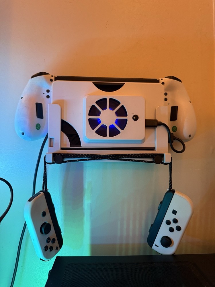 Nintendo Switch OLED (Comes W/ Aftermarket Joy-cons & Dock Wall Mount.)