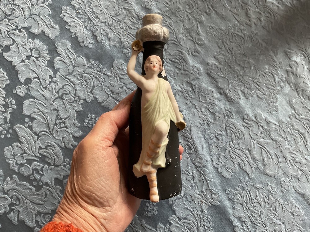 Germany bisque porcelain bottle with Greek figure 6 3/4”
