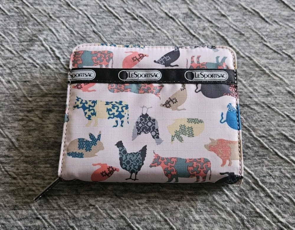 Le Sportsac Animal Print Pink Bi Fold Zip Wallet