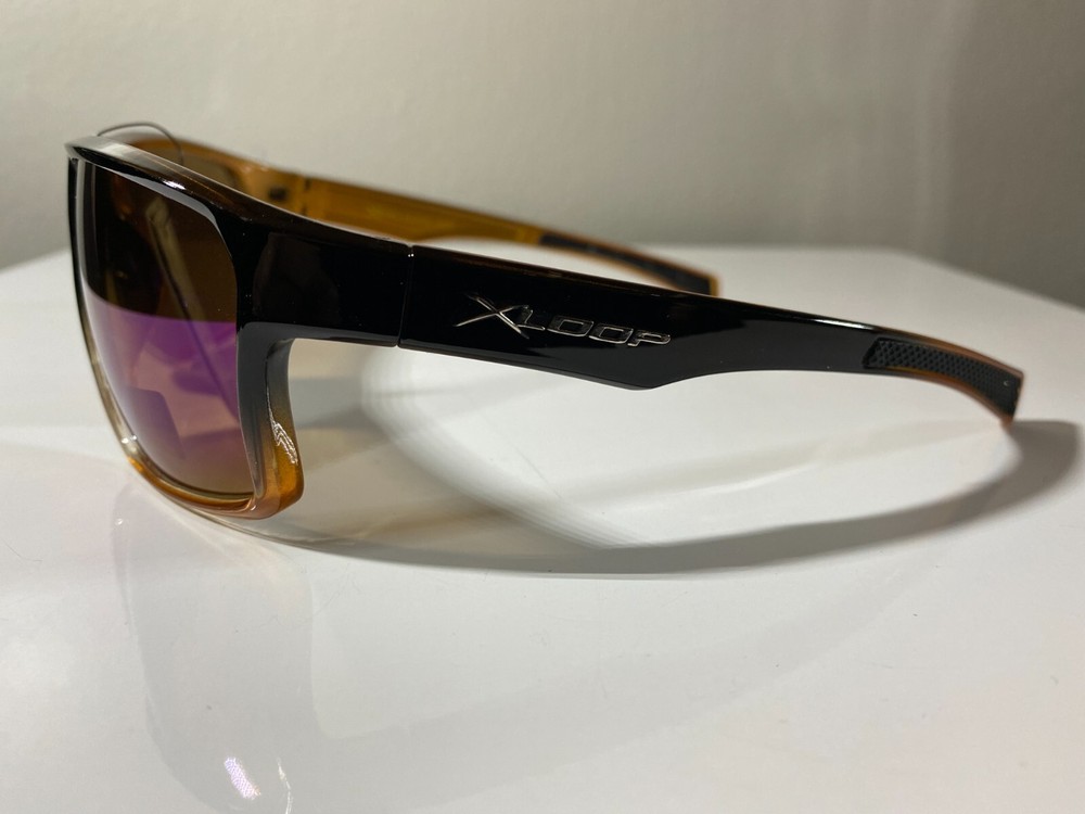 Men's black frame wrap sunglasses with purple reflective lenses
