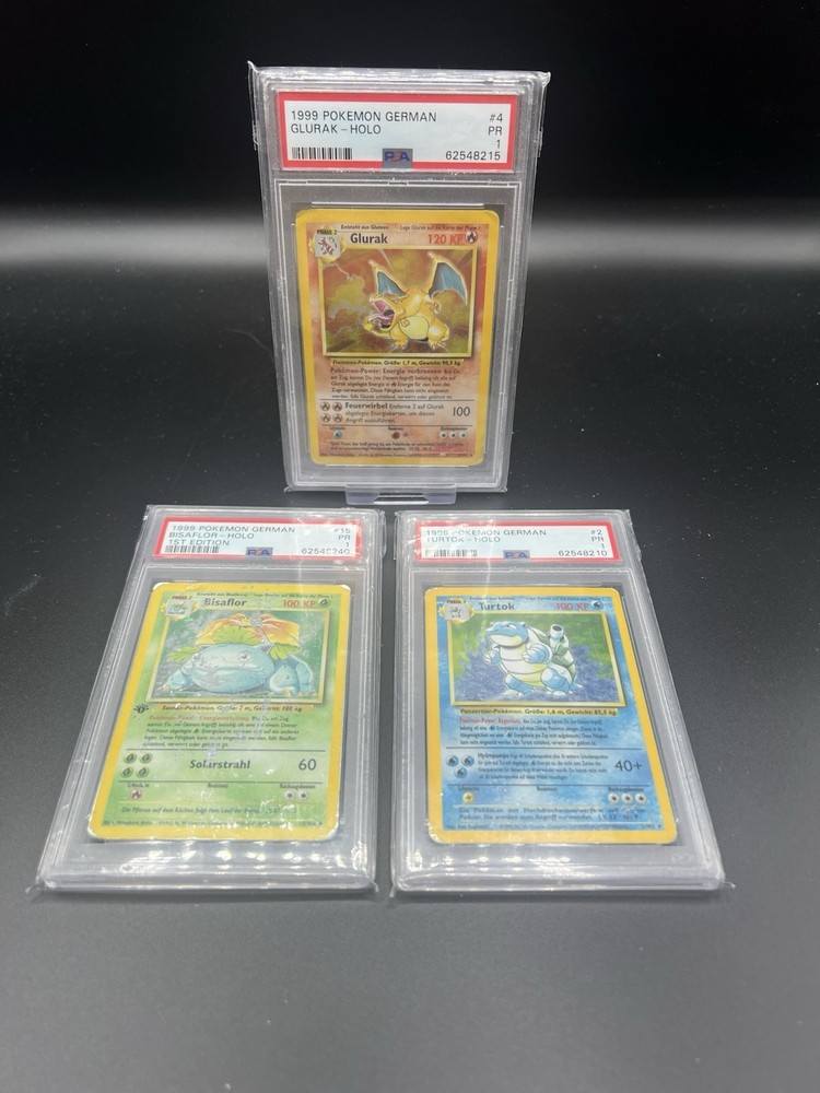Pokemon Glurak, Turtok, Bisaflor 1st Edtion, PSA 1 Set German Base Set #2 #4 #15