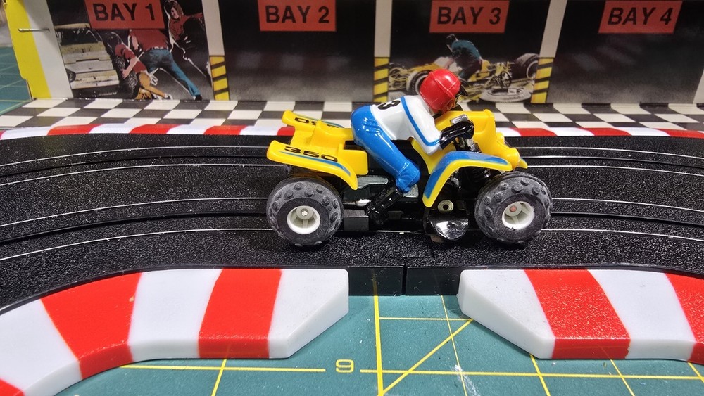 Tyco slot car #26 - Yellow/Blue - Yamaha Banshee - tested - runs