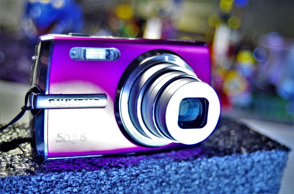 Olympus Stylus 1010 10.1MP Digital Camera with Purple Cable and Battery