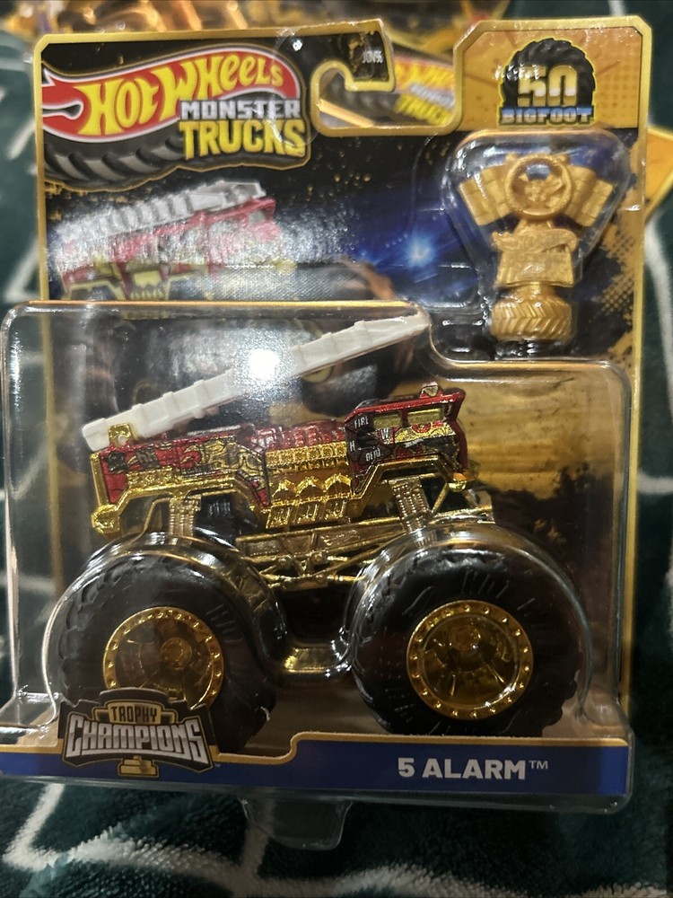 2025 HOT WHEELS MONSTER TRUCKS VHTF 50TH ANNIVERSARY GOLD NEW 5 ALARM