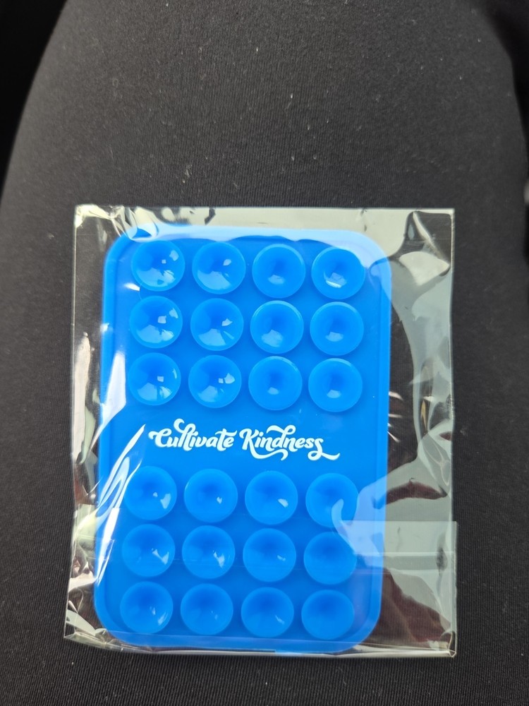 1 7BREW OCTO BUDDY for PHONE. STICKS TO MOST SURFACES. BRAND NEW IN WRAPPER