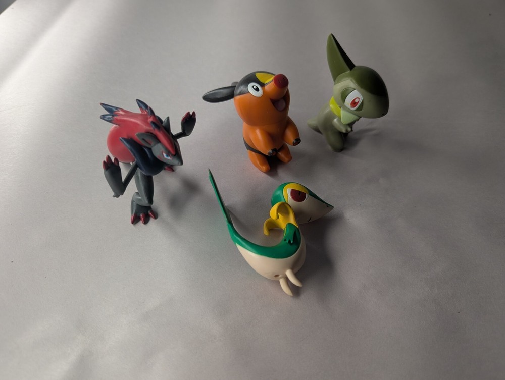 Pokemon Jakks Pacific Action Figure lot of 4, Axew, Zoroark, Snivy, Tepig