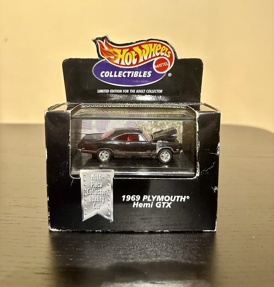 HOT WHEELS COLLECTIBLES 1969 PLYMOUTH HEMI GTX BLACK 1:64 - Factory Seal