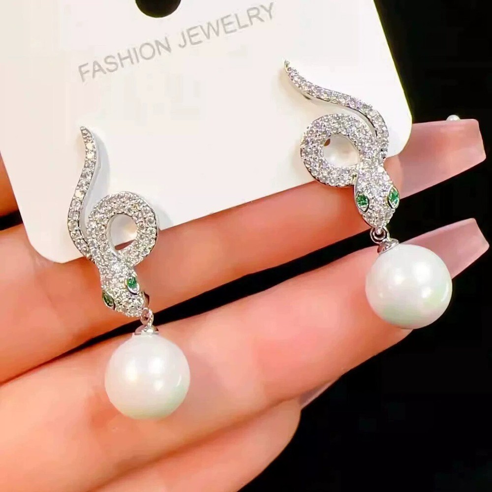 2025 New AAAA 10-11mm Natural South Sea Round Pearl Star Same Style 925 Earrings