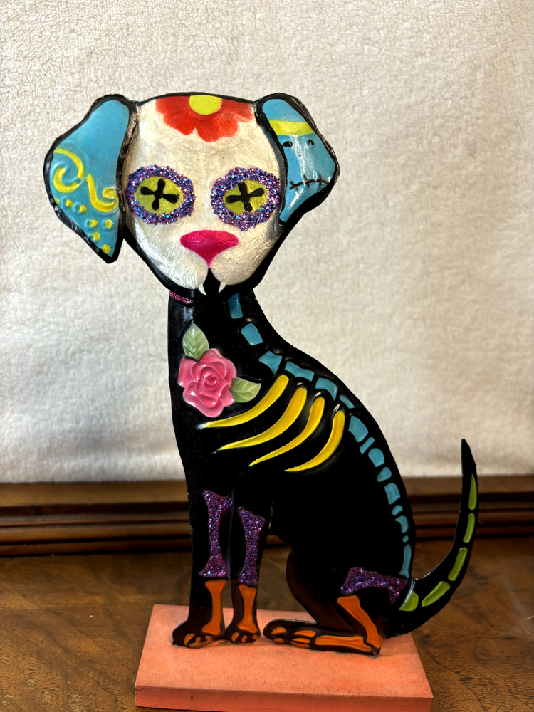 Colorful metal Mexican dog statue is 10 inches tall and 5 inches wide.