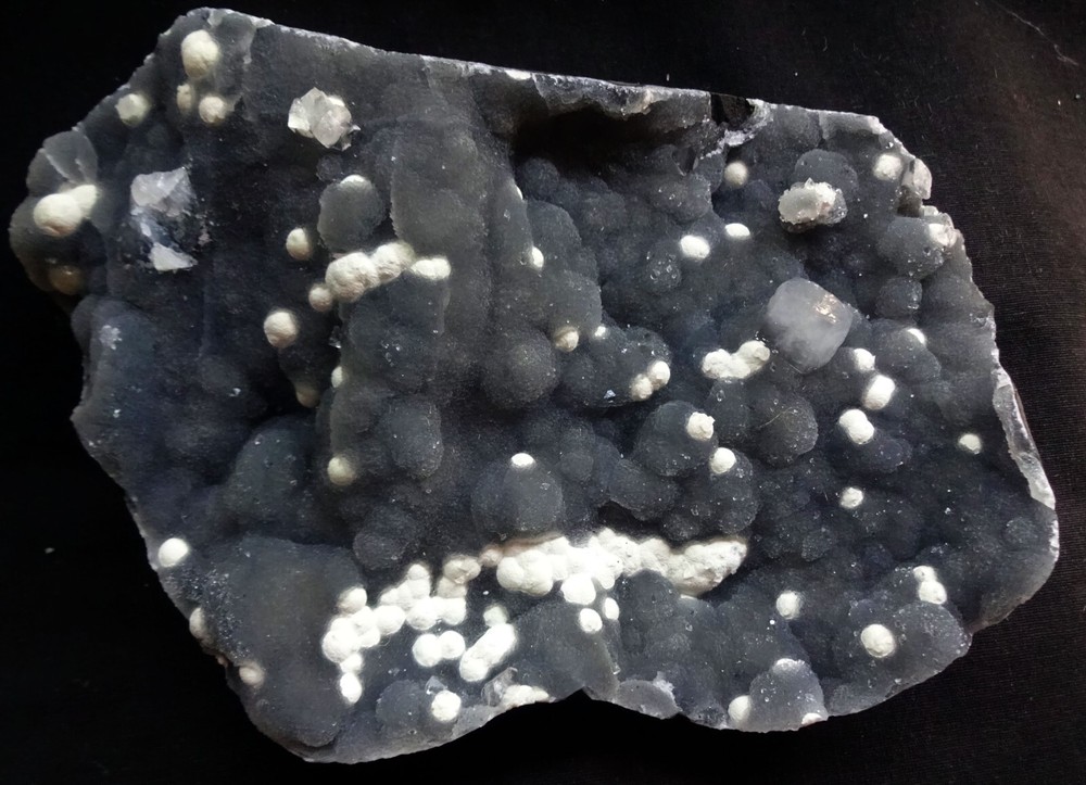 Stunning fluorite balls with apophyllite crystals on chalcedony matrix
