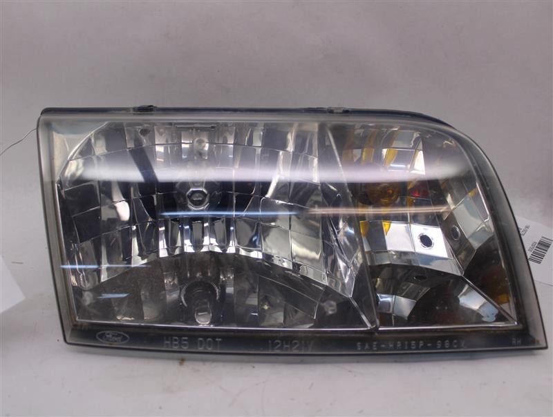 Used Right Headlight Assembly fits: 1999 Ford Crown victoria Right Grade A