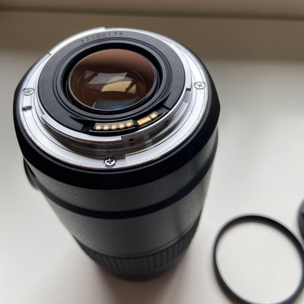 Canon EF 75-300mm f4-5.6 III telephoto zoom lens with caps hood used