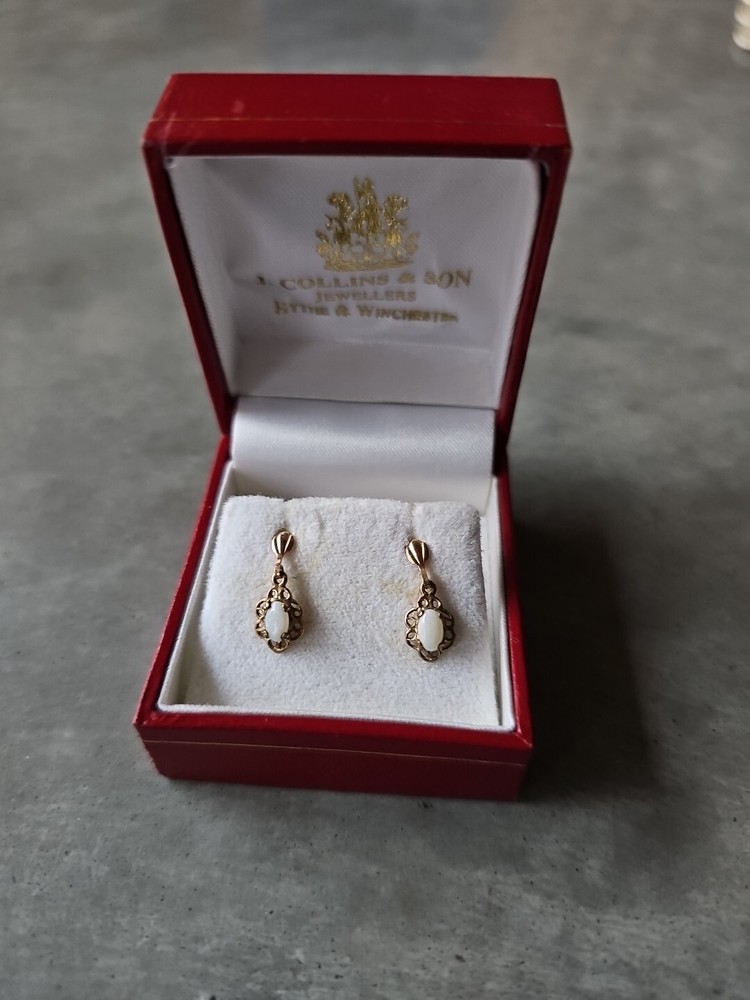 Elegant 9ct Gold Dangly Stud Earrings Featuring Delicate Opal Accents