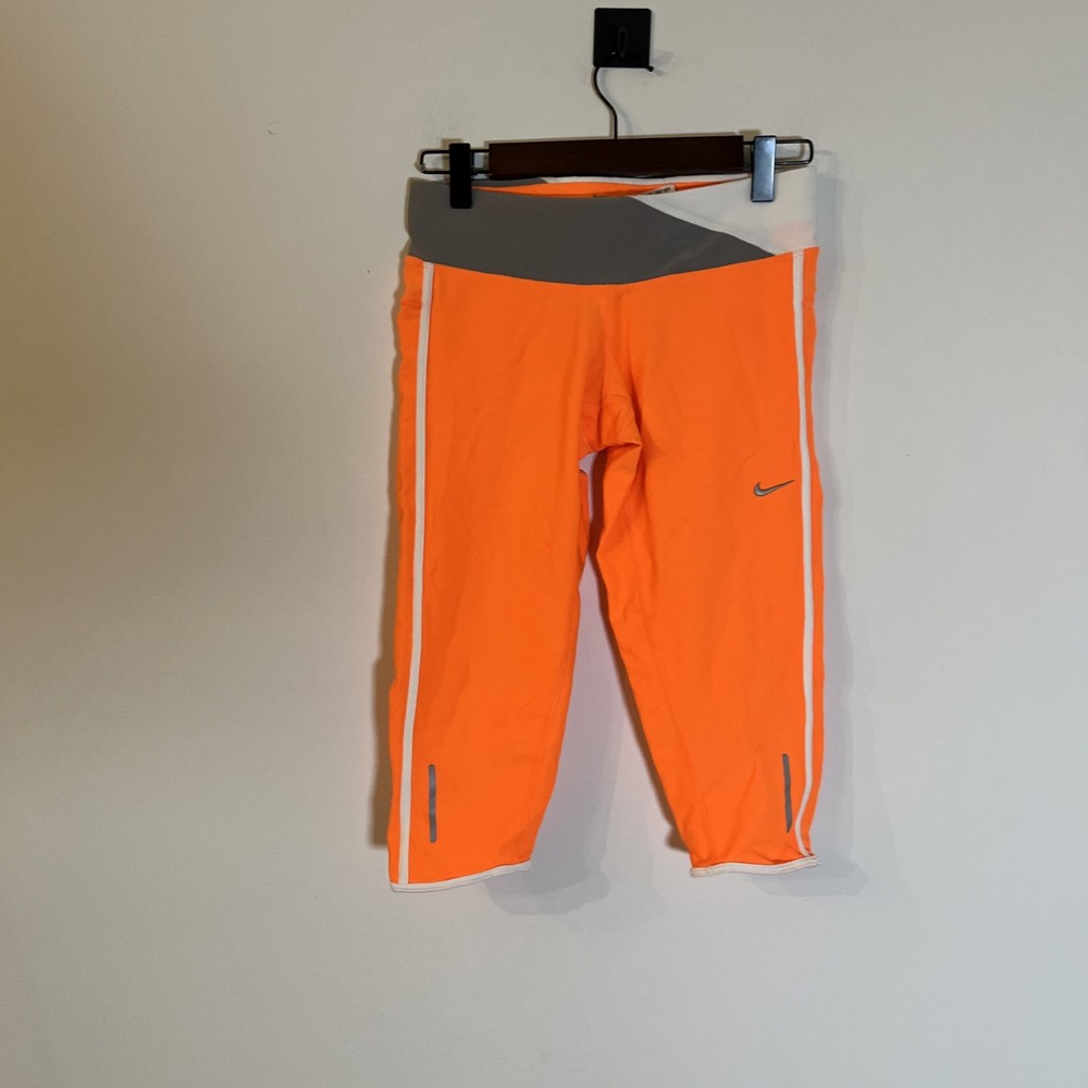 Nike Dri-FIT Twisted Capri Womens Orange Leggings Shorts Size XS NWT