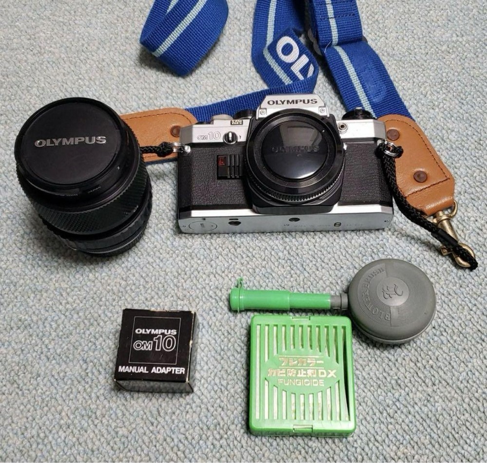 Olympus OM10 35mm Film Camera with 55mm Telephoto Lens and Case - Used 0612