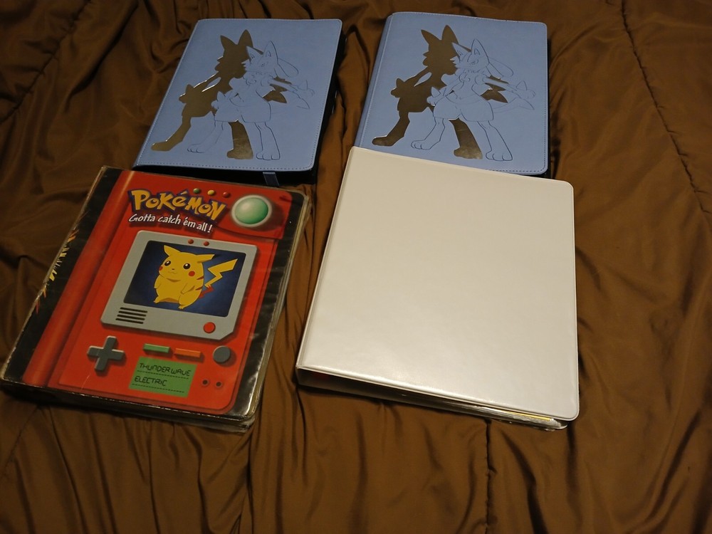Over 1,500+ Pokémon cards in 4 binders, look brand new and in good condition.