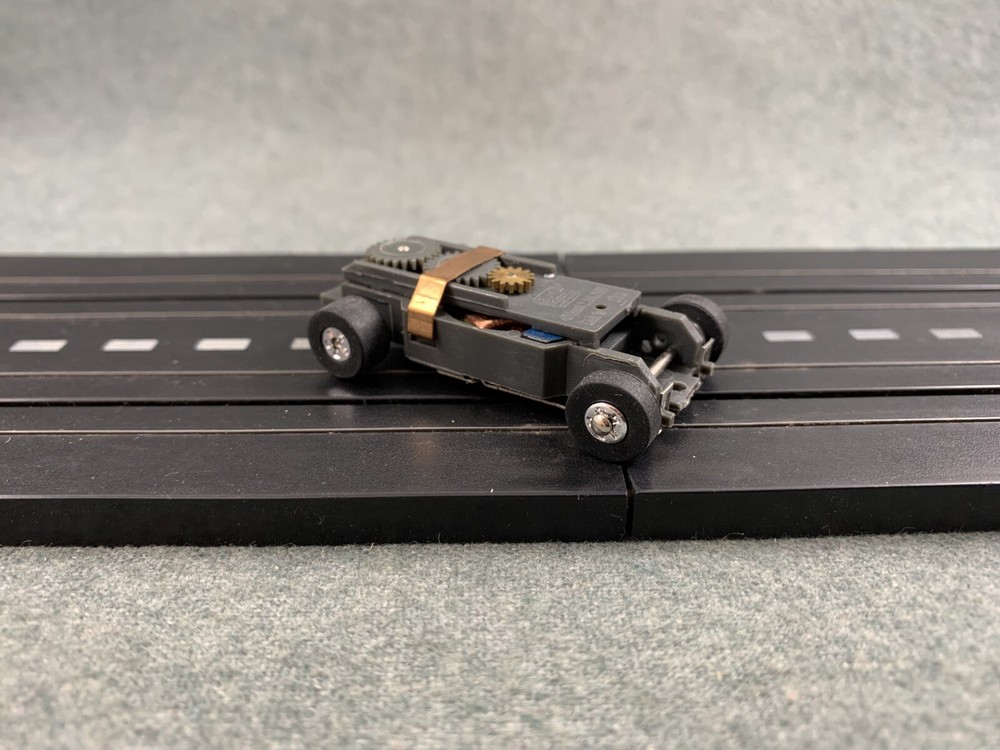 Auto World  Round 2 HO Scale Thunder Jets  Ultra G Slot Car Chassis Used