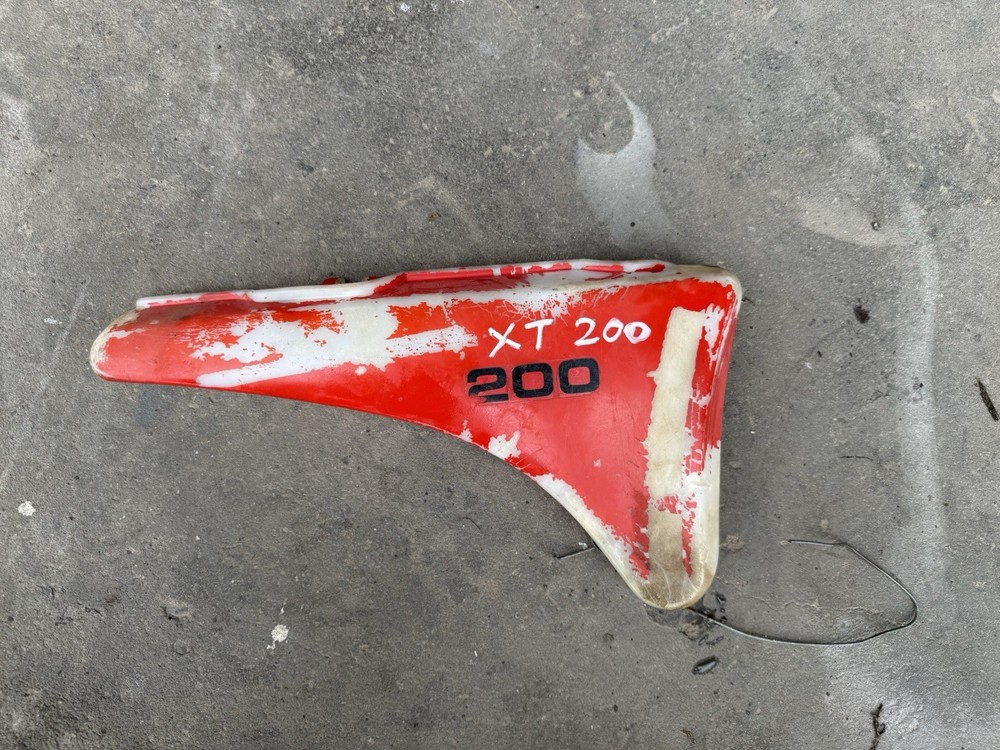 Yamaha XT200 OEM Genuine Side Cover Plastic Trim Parts