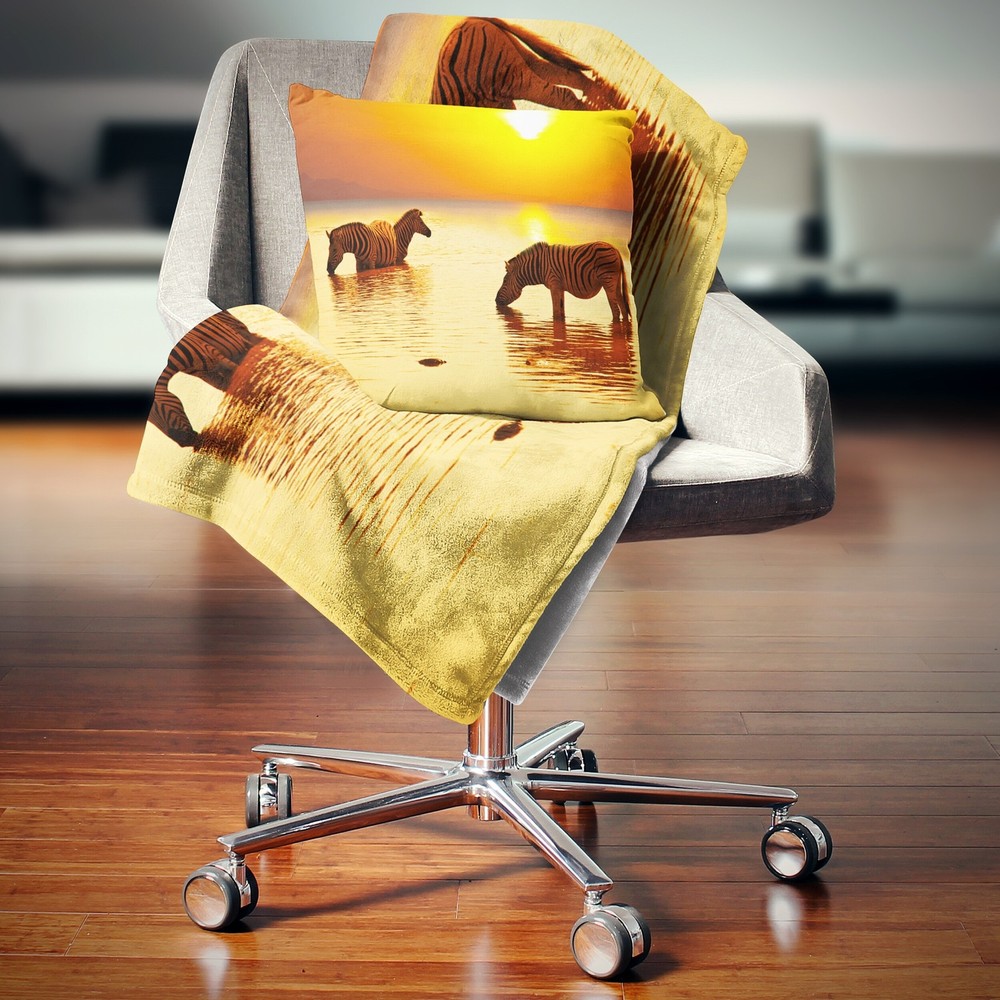 Designart 'Zebras Drinking in Lake at Sunset' Animals Throw Gold 71 in. x 59 in.