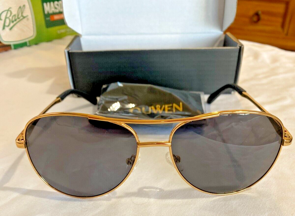 Ouwen aviator style goldtone rimmed sunglasses, new with tags original packaging