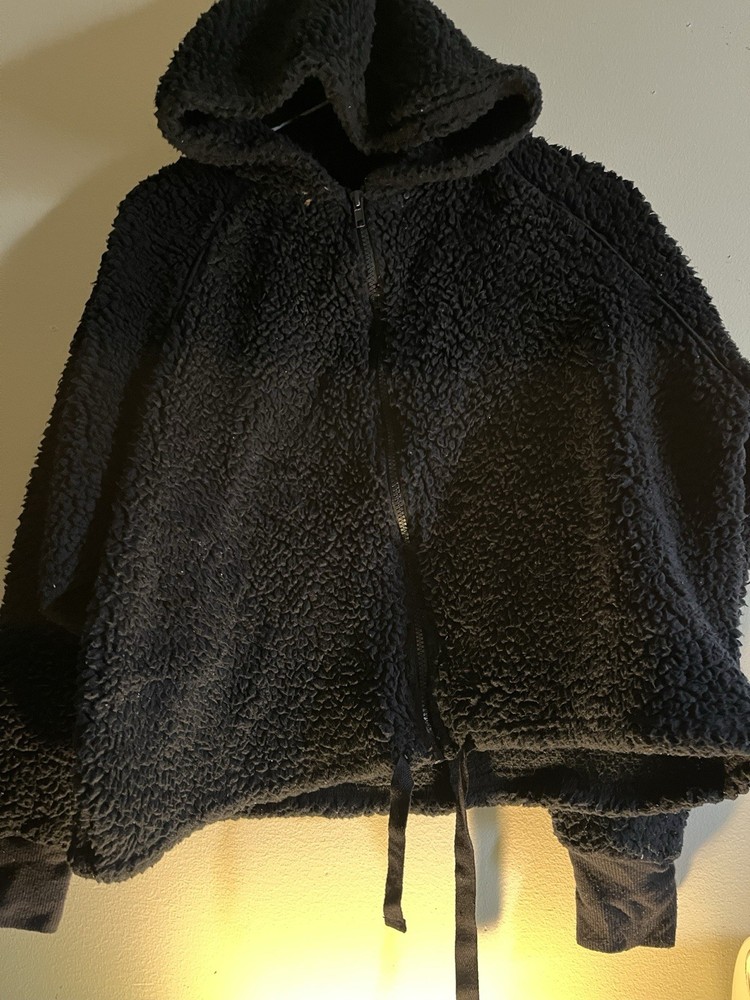 Black fleece zip-up hoodie with drawstring