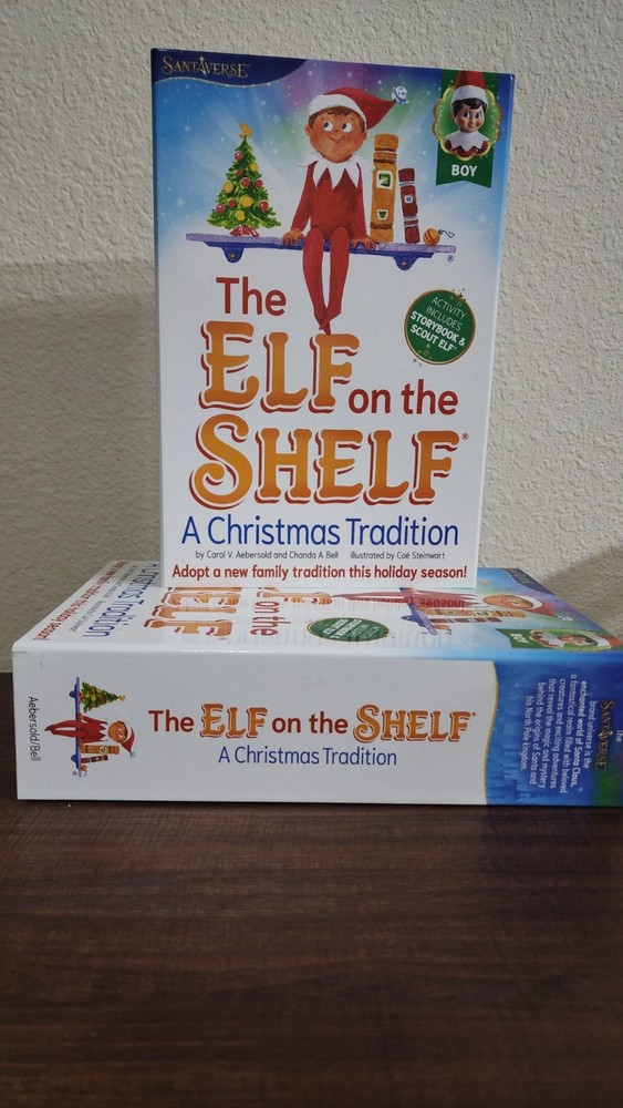 The Elf on the SHELF A Christmas Tradtioin Blue Eyed Boy scout with History Book