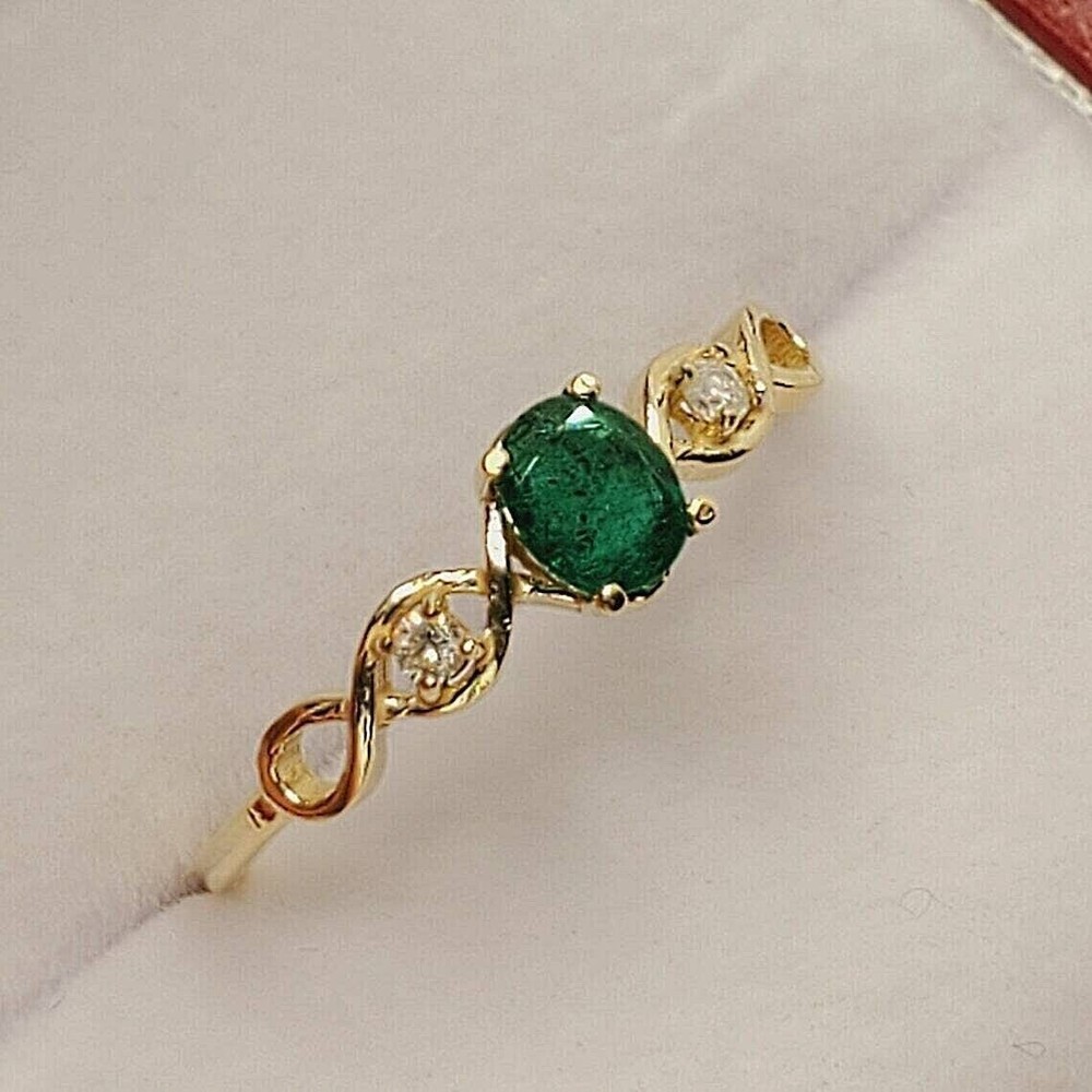 Twisted 2Ct Oval Emerald Simulated Ring 14 yellow Gold Plated for Women