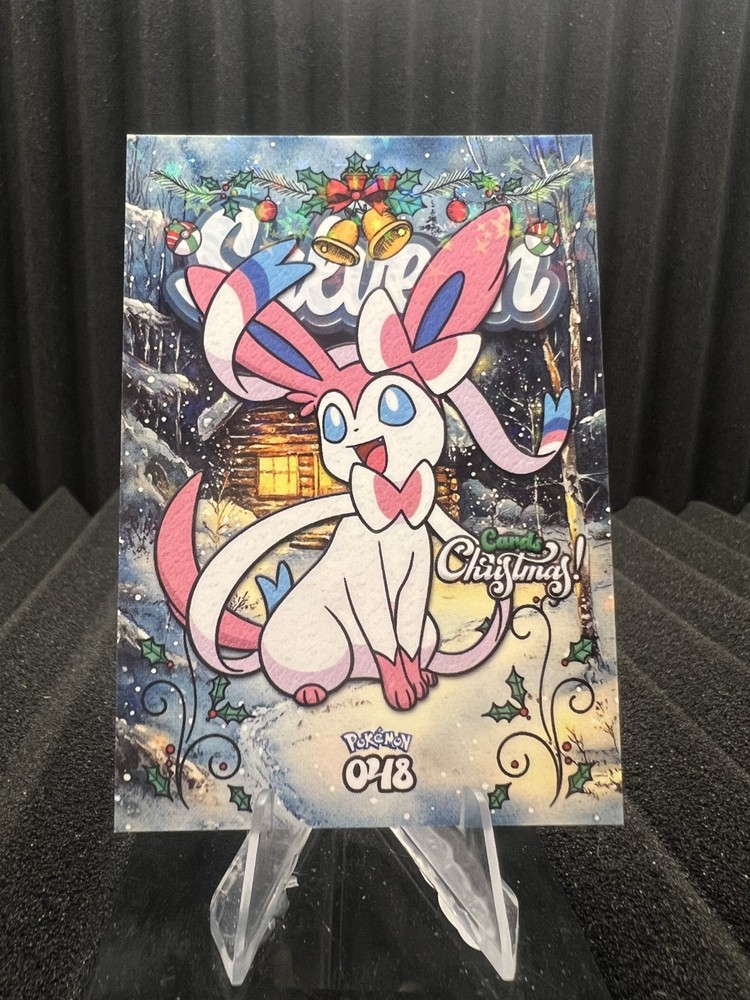 Sylveon #48 - Star Holo - Prisma Christmas Cards 2025 - Pokemon