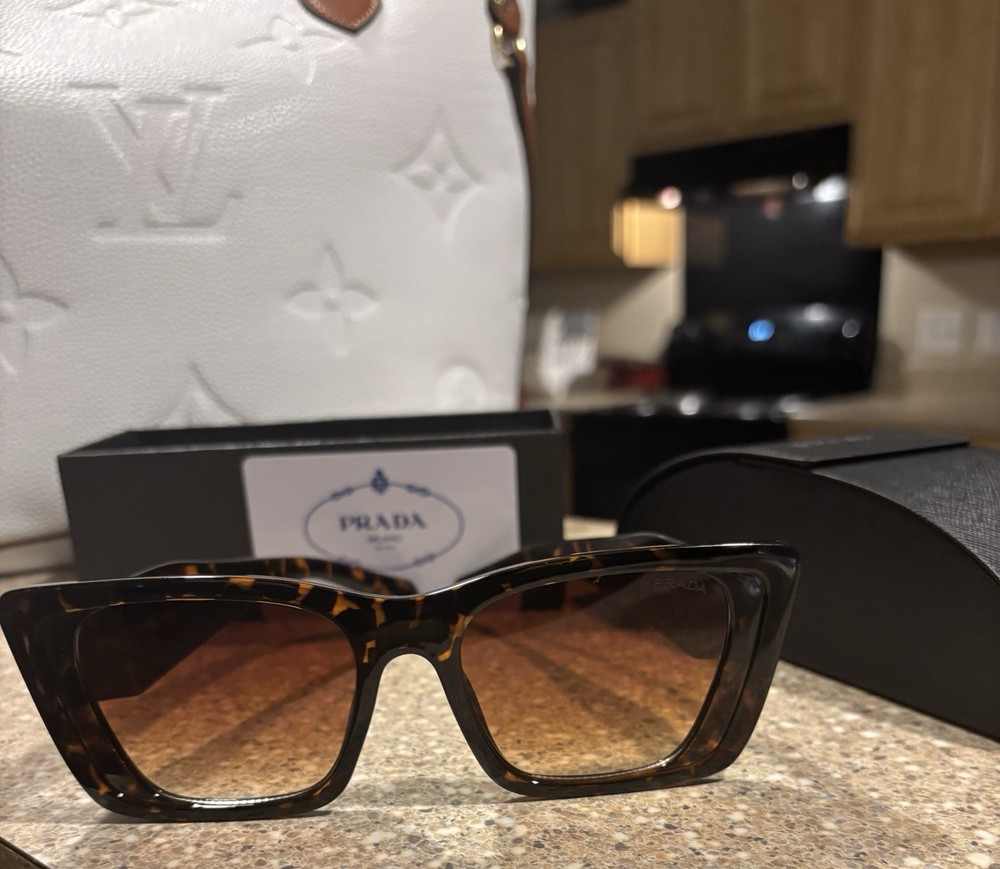 Prada women's tortoise shell sunglasses stylish designer shades