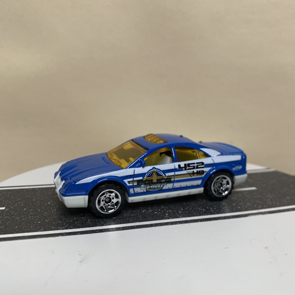 2002 Matchbox Rescue Chiefs Series Police Car Blue & White w/Sawblade Wheel
