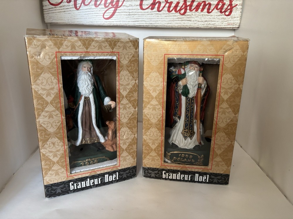 2-grandeur noel hand-painted Porcelain Santa of the world collectors edition