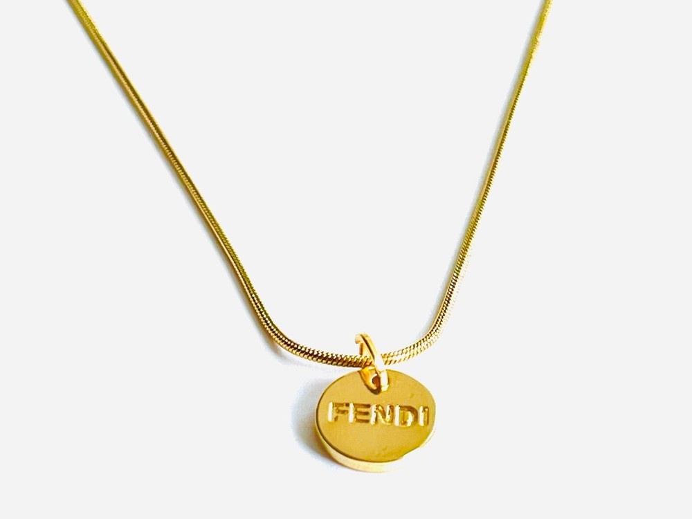 Upcycled necklace with authentic button