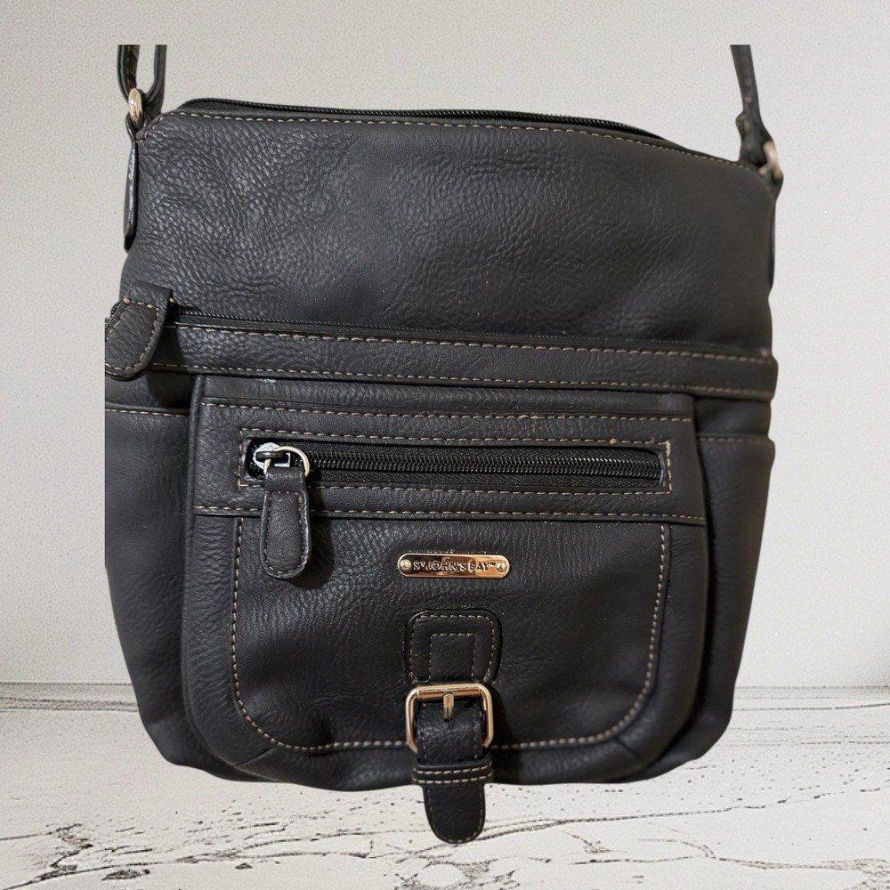 a black faux leather MultiSac Flare Crossbody bag.