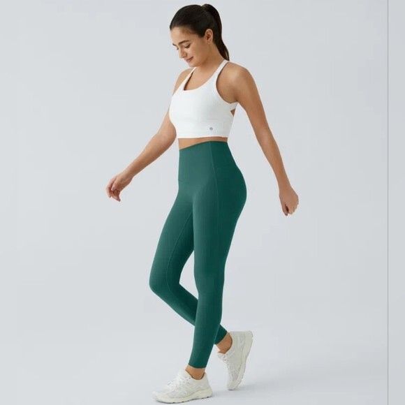 Halara Medium High Waisted Sculpting Leggings with Pockets in Green