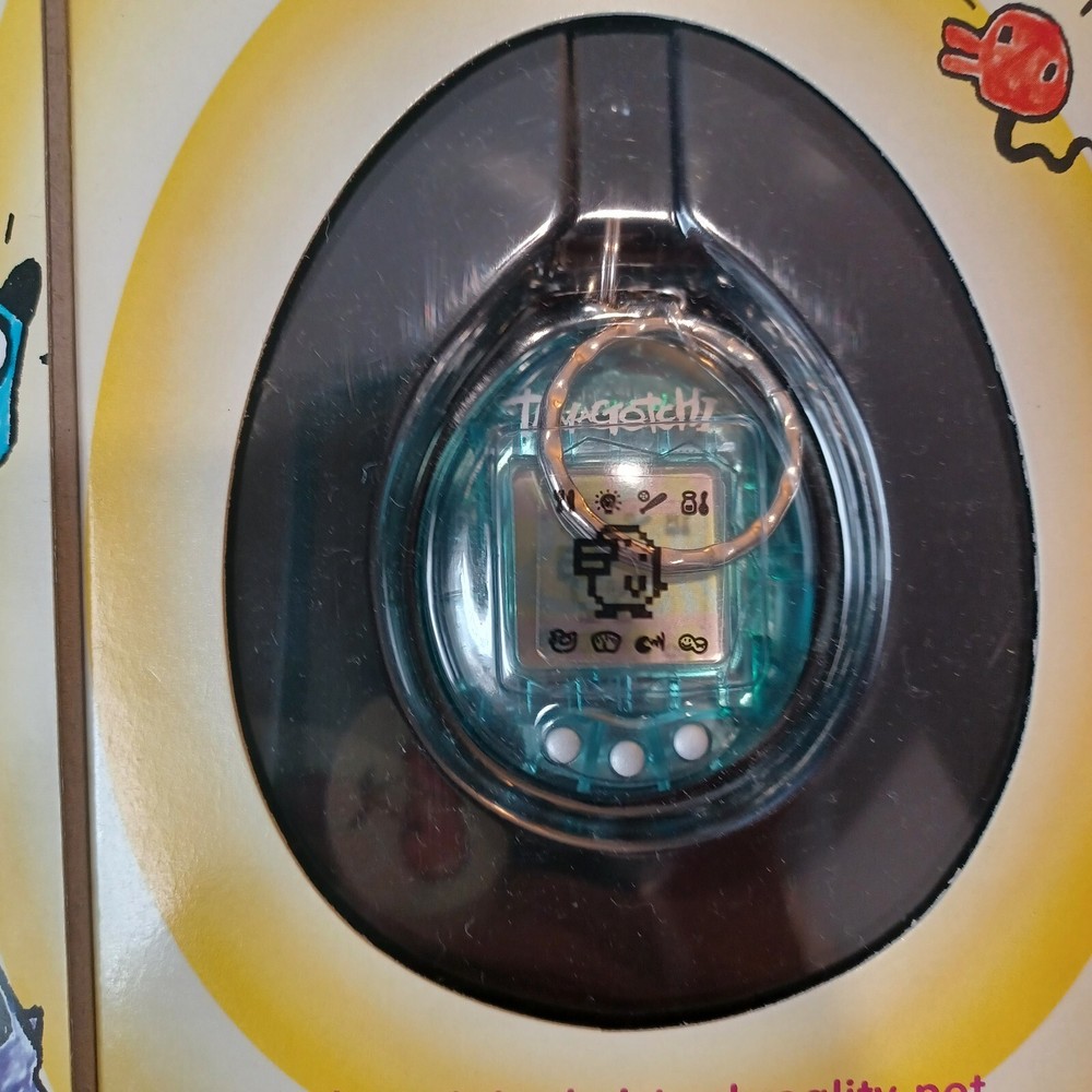 Tamagotchi Original 1997 Bandai Virtual Pet RARE Clear Blue  original BOX DAMAGE
