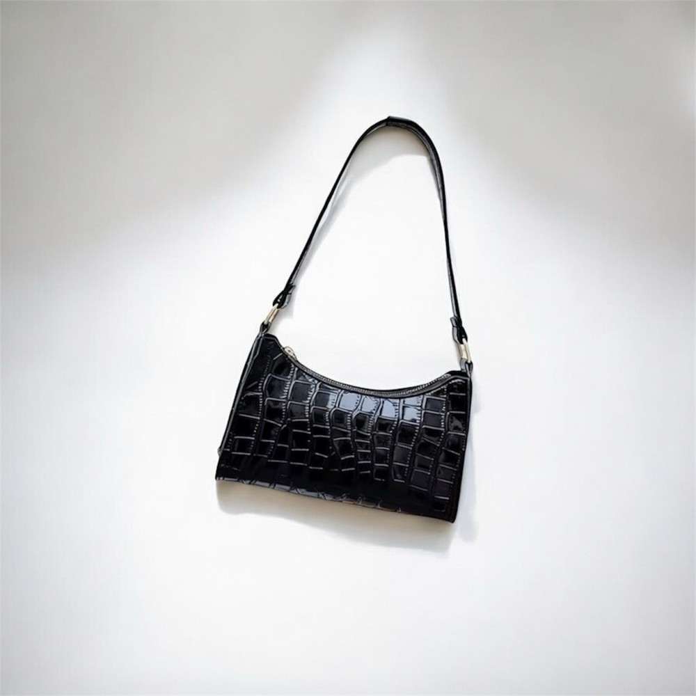 Black croc-embossed mini shoulder bag with a glossy patent finish
