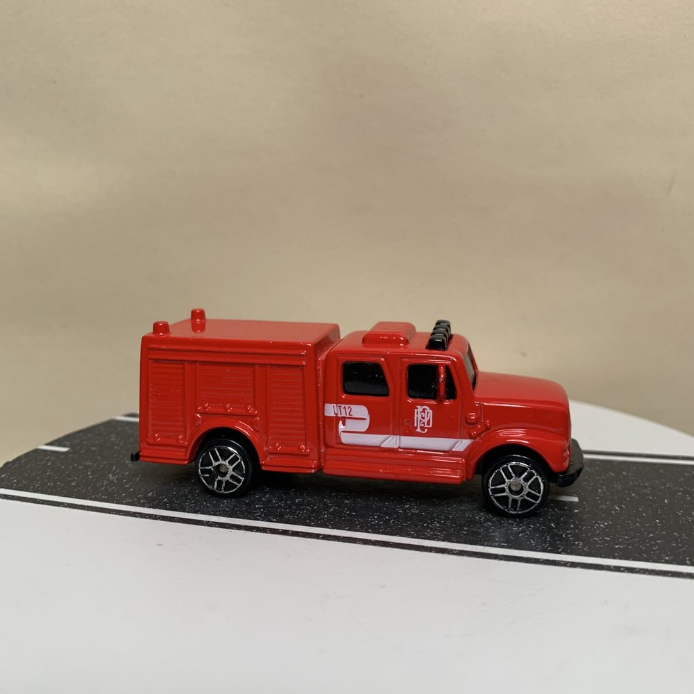 Maisto Equipment Truck Fire Department LT12 Red/White w/5 Spoke Wheels 1:64