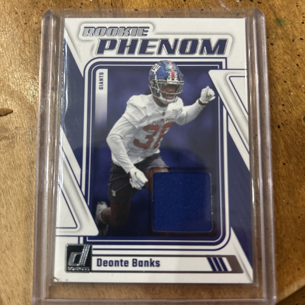 2023 Panini Donruss - Rookie Phenom Jerseys #RPJ-DBAN Deonte Banks (MEM, RC)