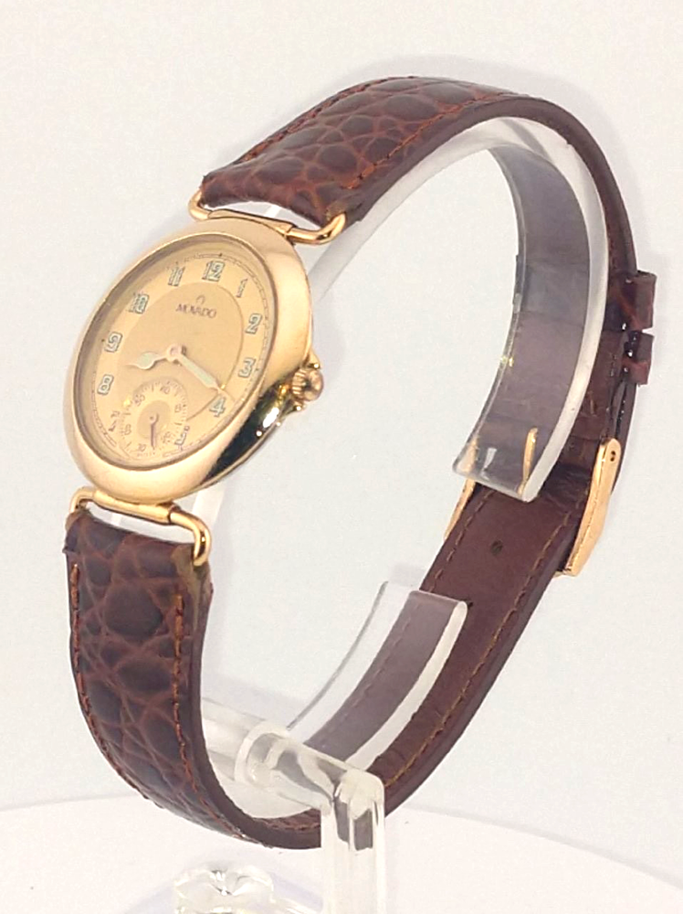 Vintage Movado Ladies Gold Plated Watch with Luminous Roman Numerals Model 82.08.820