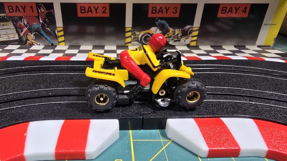 Tyco slot car #25 - Yellow/Red - Yamaha Banshee - tested - runs