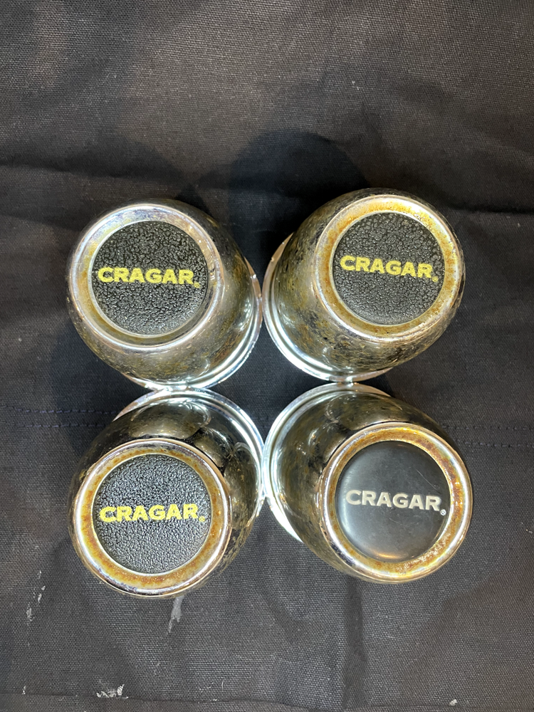 vintage Cragar wheel center caps Rusty