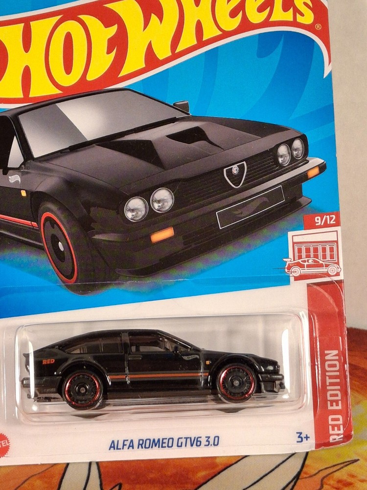 2024 Hot Wheels J Case Target Red Edition Alfa Romeo GTV6 3.0 in Sleek Black Finish
