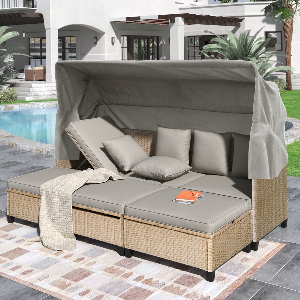 4-piece rattan patio sofa set with sunshade cushions and table