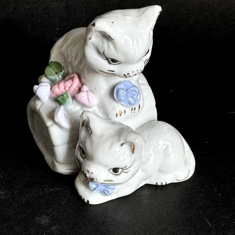 Porcelain Cat Figurine with Gold Pink Blue Accents and Floral Log Design